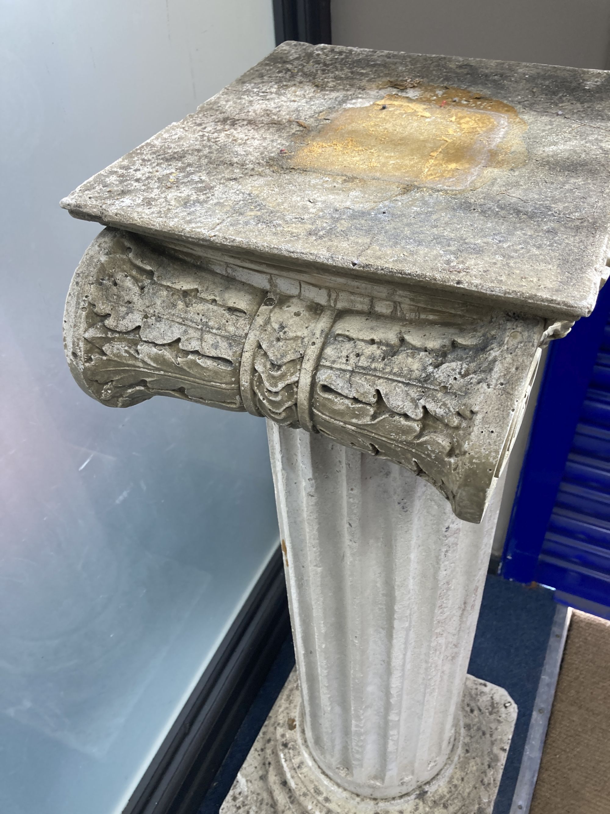 A reconstituted stone ionic garden pedestal, width 39cm, height 104cm